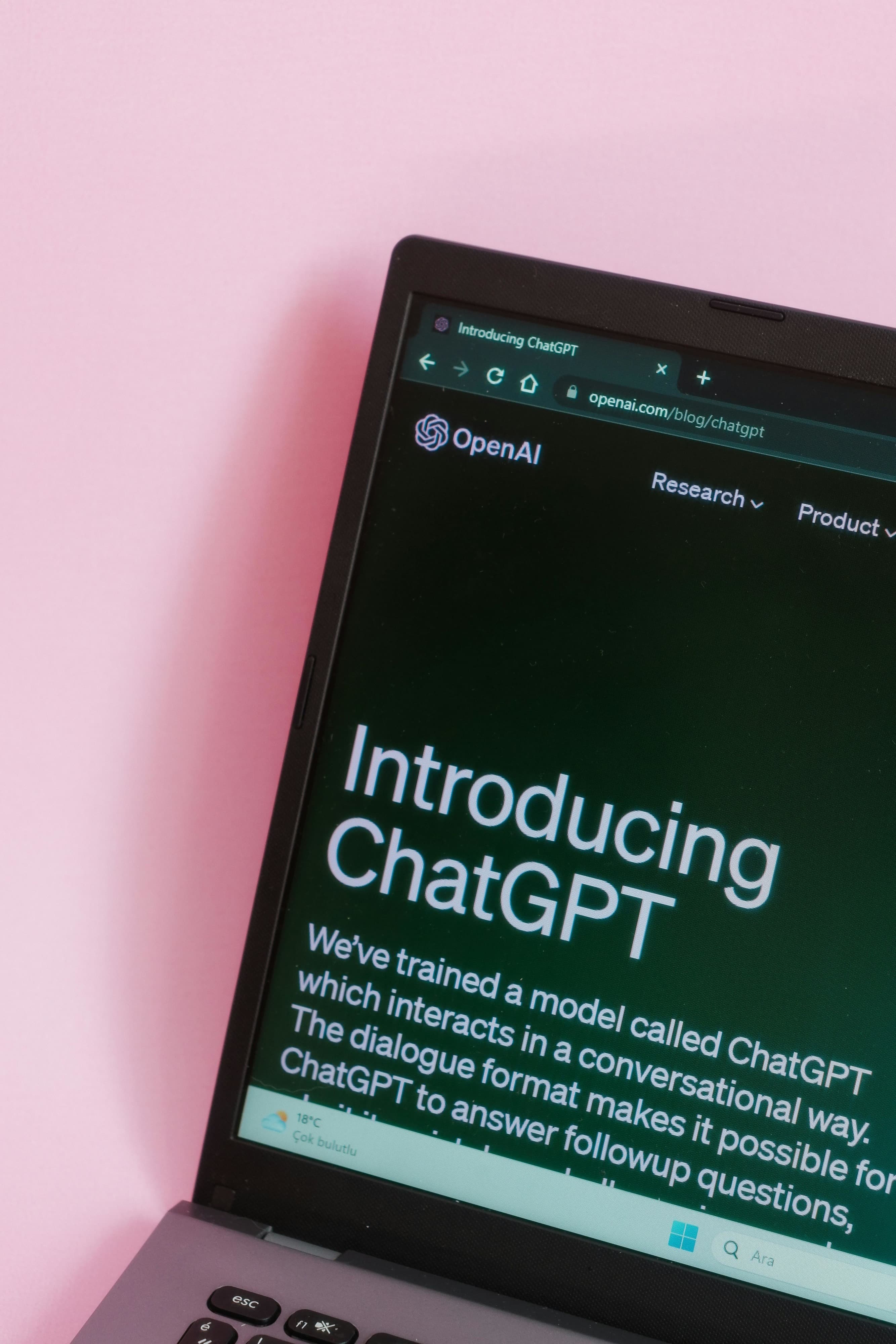 image of chat gpt on a computer with a pink wall behind. A perfect example of emerging technologies in digital pr